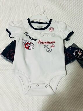 Genuine Merchandise Cleveland Guardians White Infant Bodysuit with Navy Skirt.